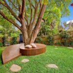 backyard design around tree