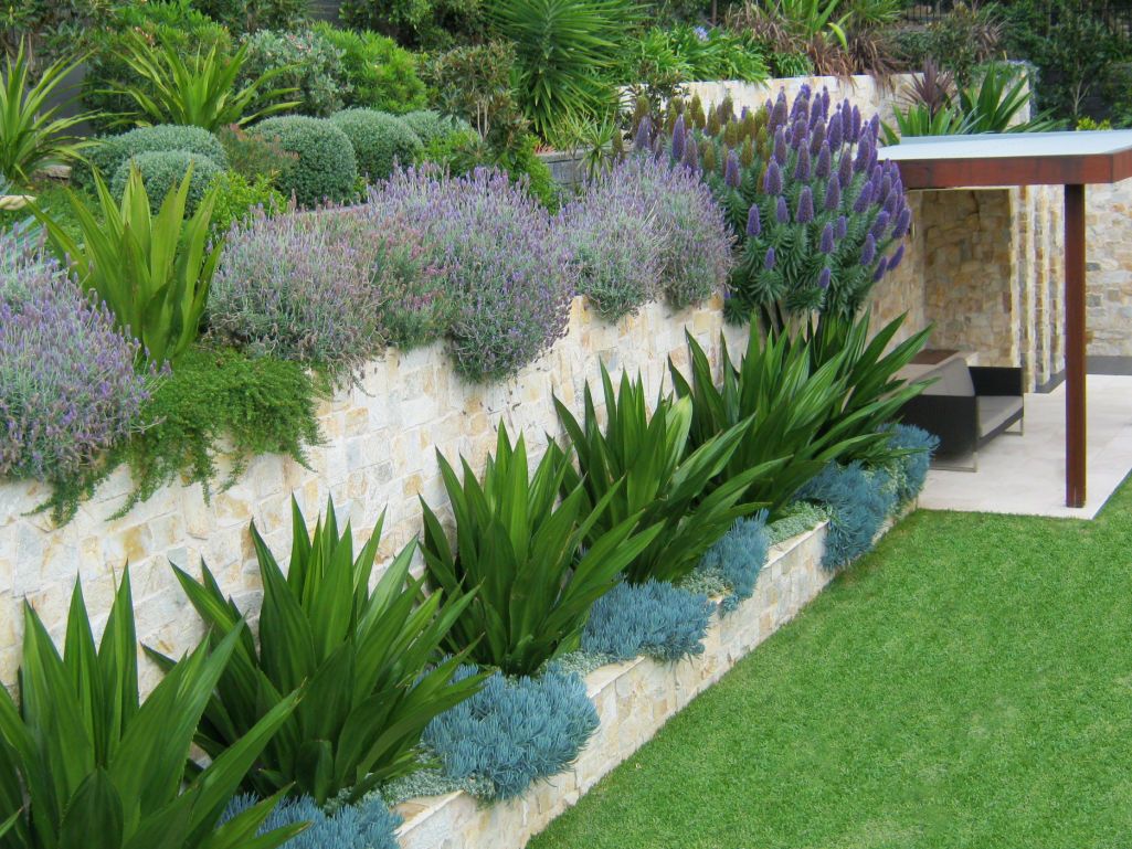 Transform Your Outdoor Space with a
Stunning Backyard Design Retaining Wall