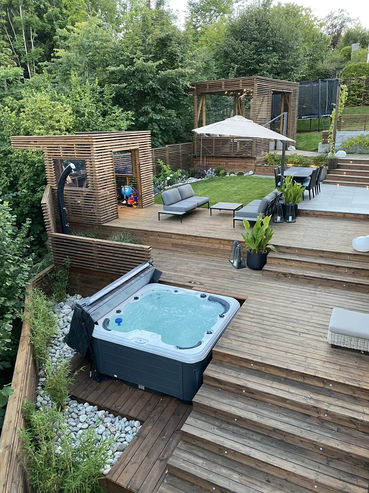 Creating the Ultimate Outdoor Oasis: How
to Design a Backyard with a Hot Tub and Fire Pit