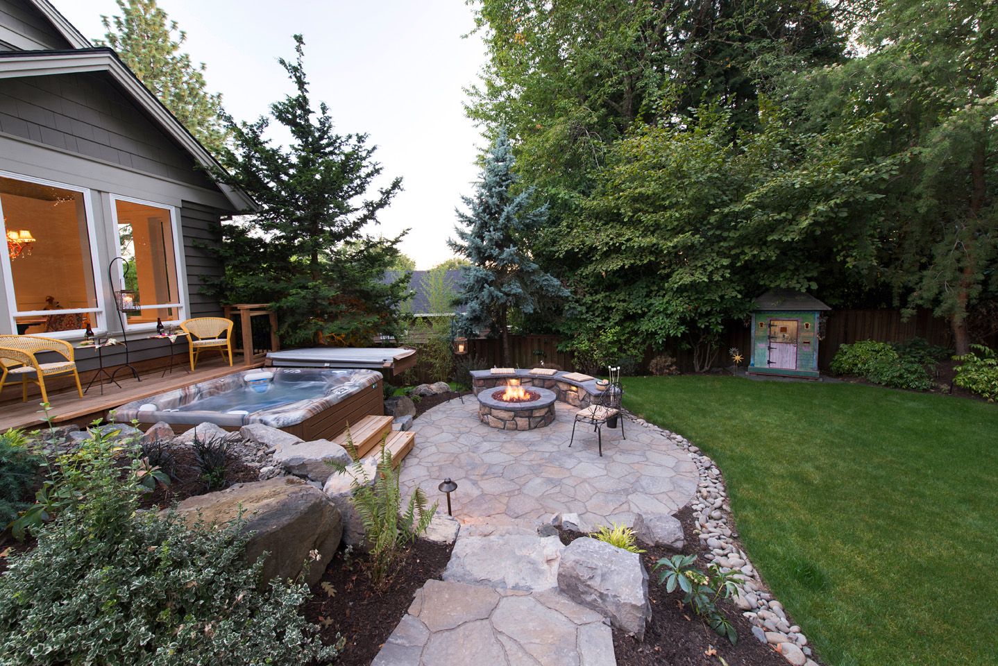 Creating a Luxurious Oasis: Designing a
Backyard with a Hot Tub and Fire Pit