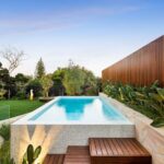 backyard patio designs with pool