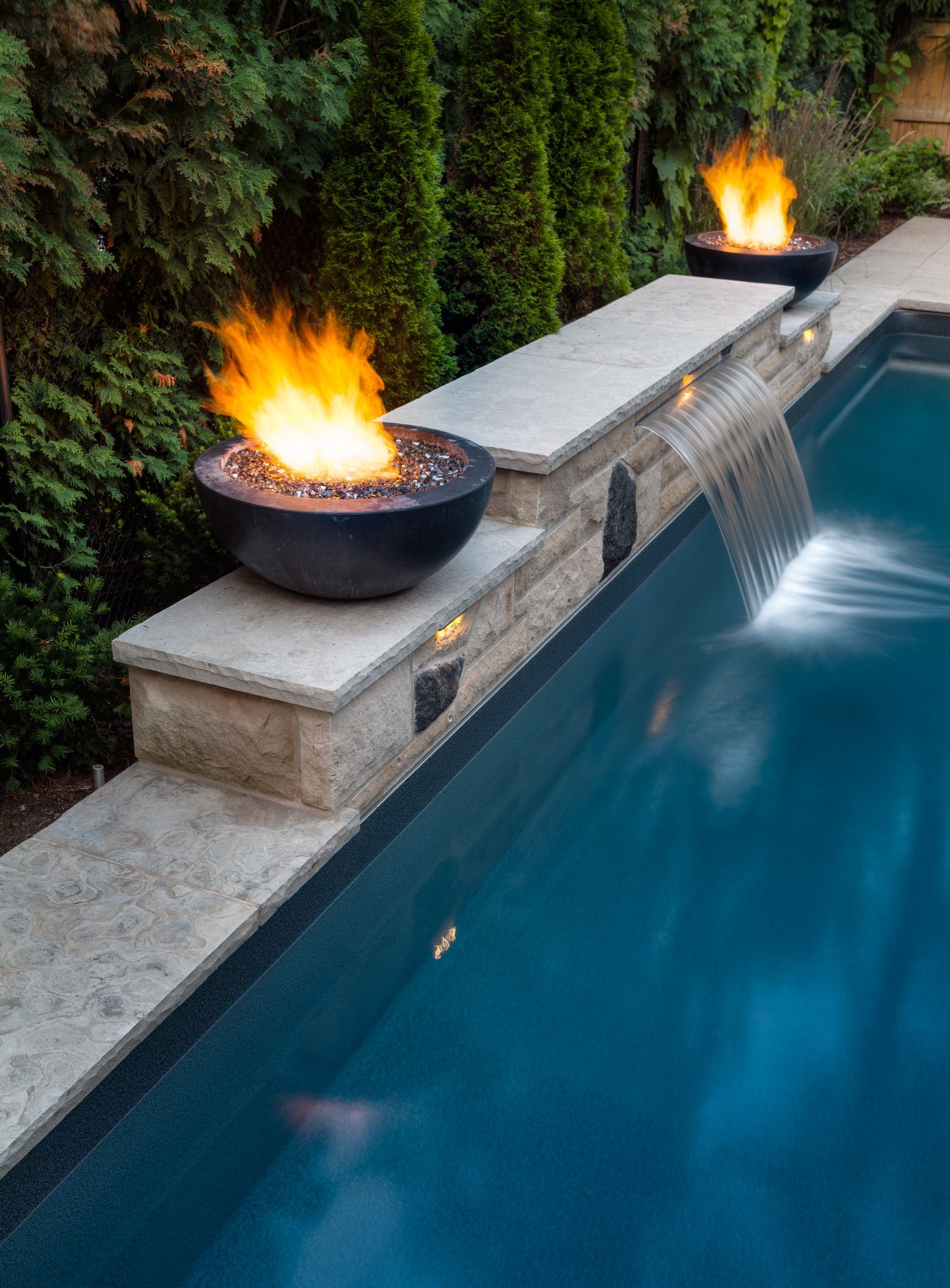 Enhance Your Outdoor Oasis with a
Backyard Design Featuring a Pool and Fire Pit