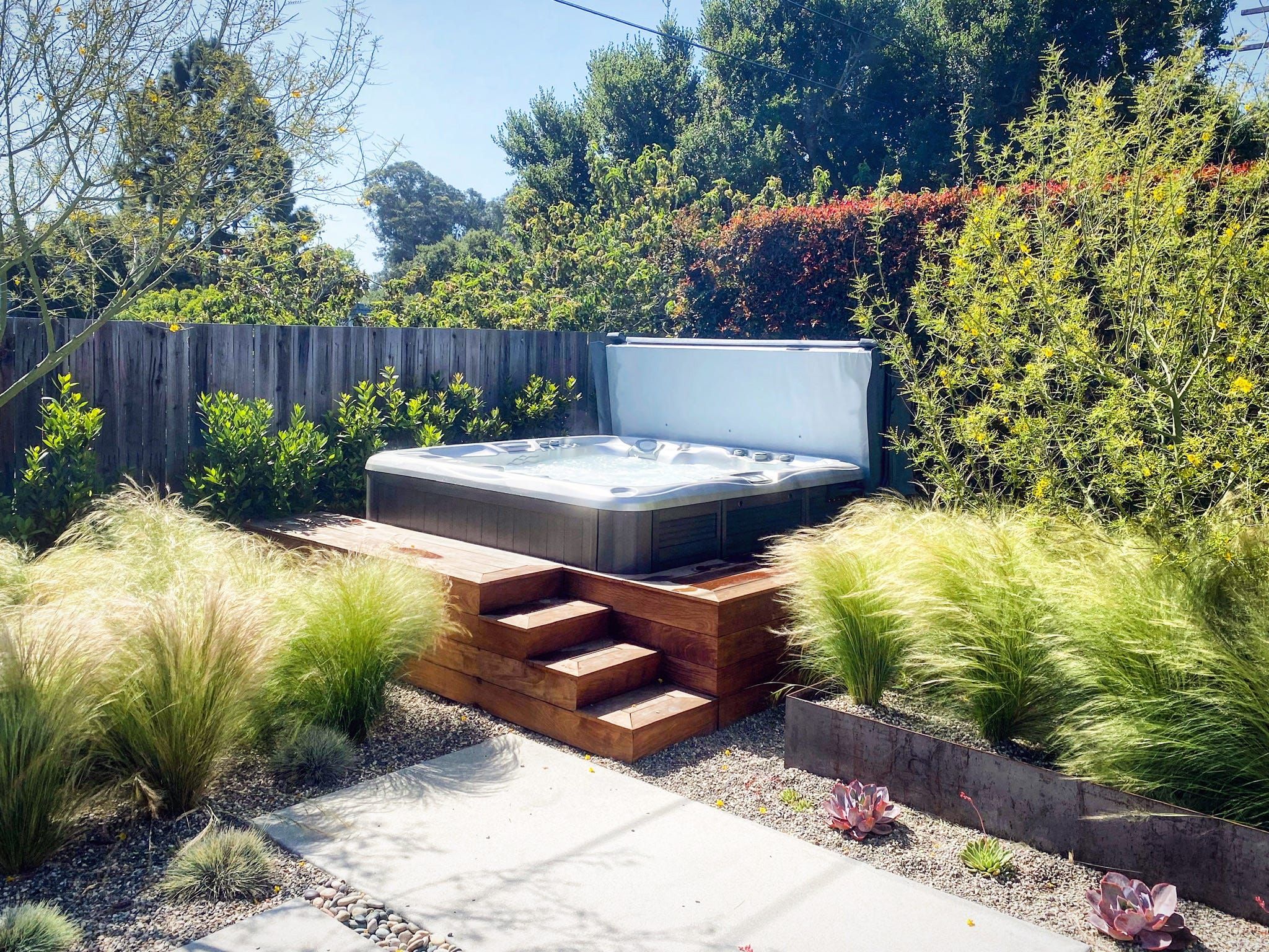 Transform Your Backyard Oasis with a
Luxurious Hot Tub Design