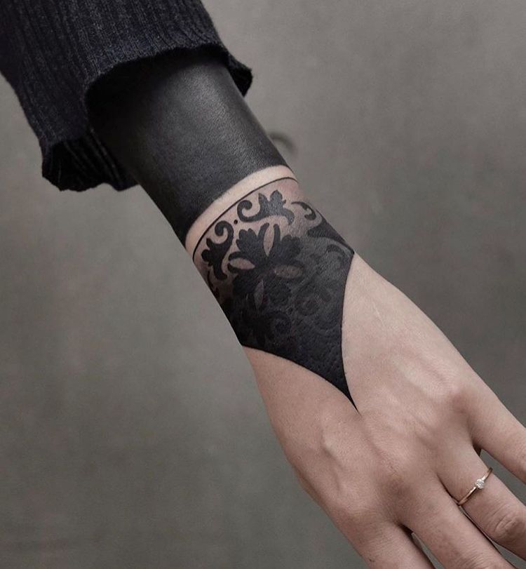 Exploring the Intriguing World of Blackout Tattoos: A Bold Statement in Body Art