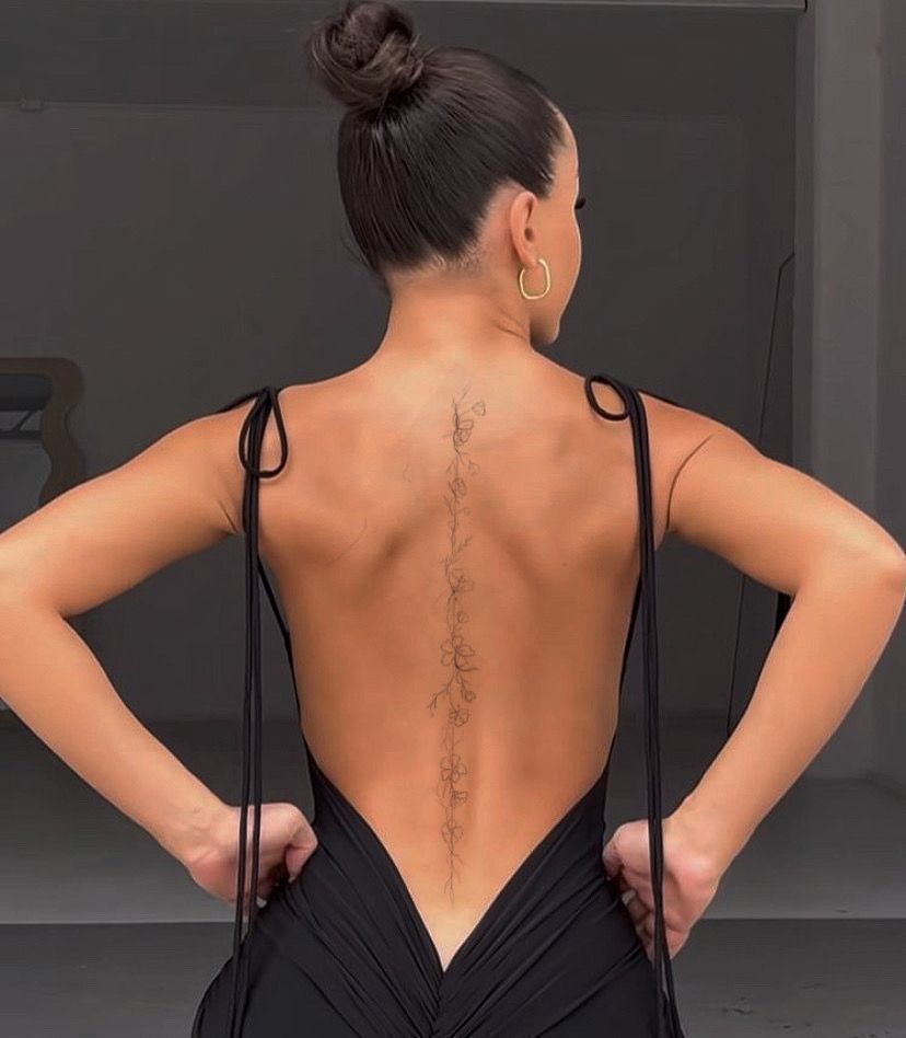 The Beauty and Symbolism of Spine Tattoos