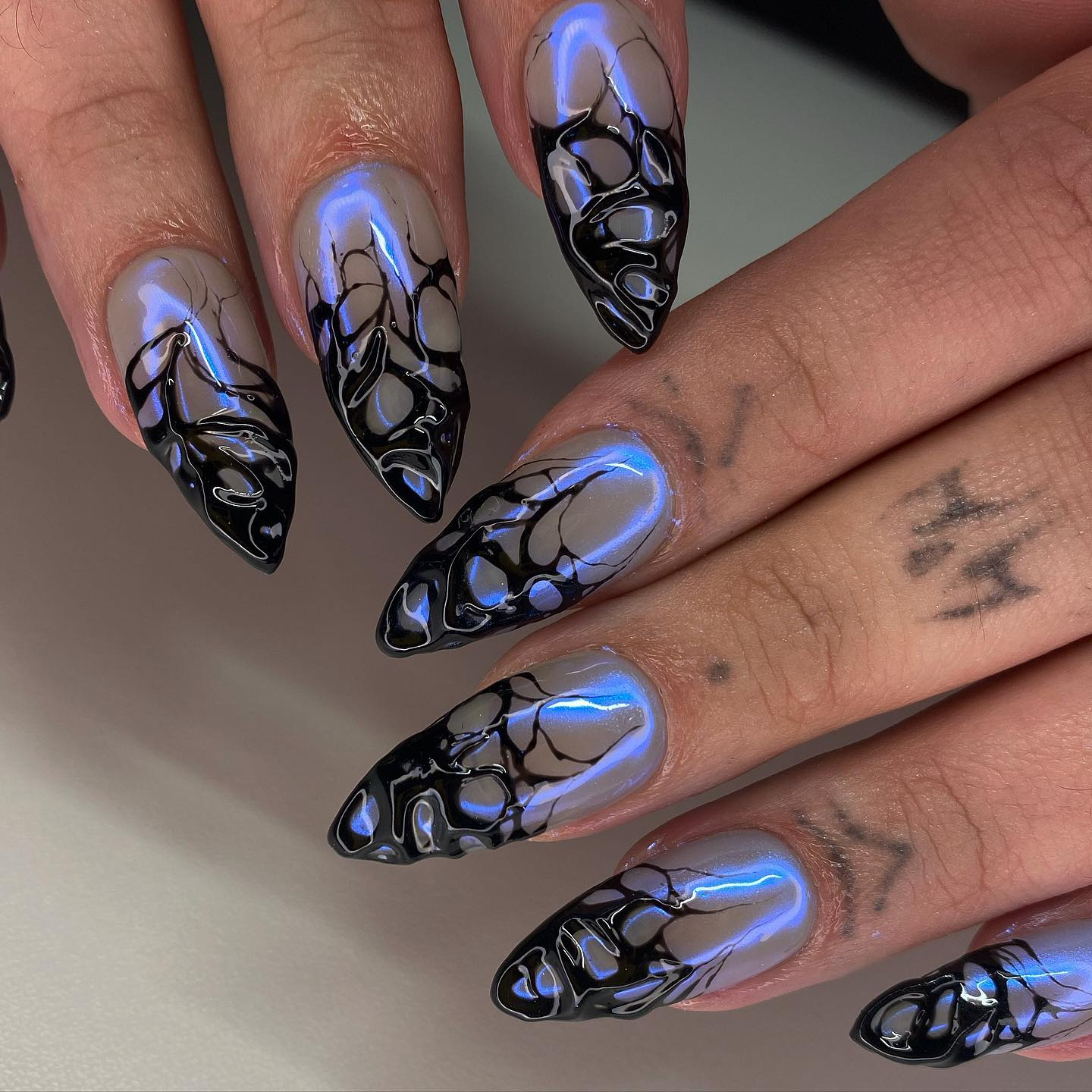 The Latest Trend: Tattoo Nails – The Ultimate Nail Art Statement