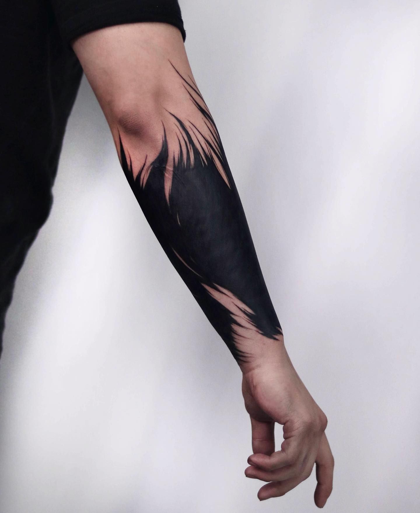 The Rise of Blackout Tattoos: Exploring the Bold and Beautiful Trend