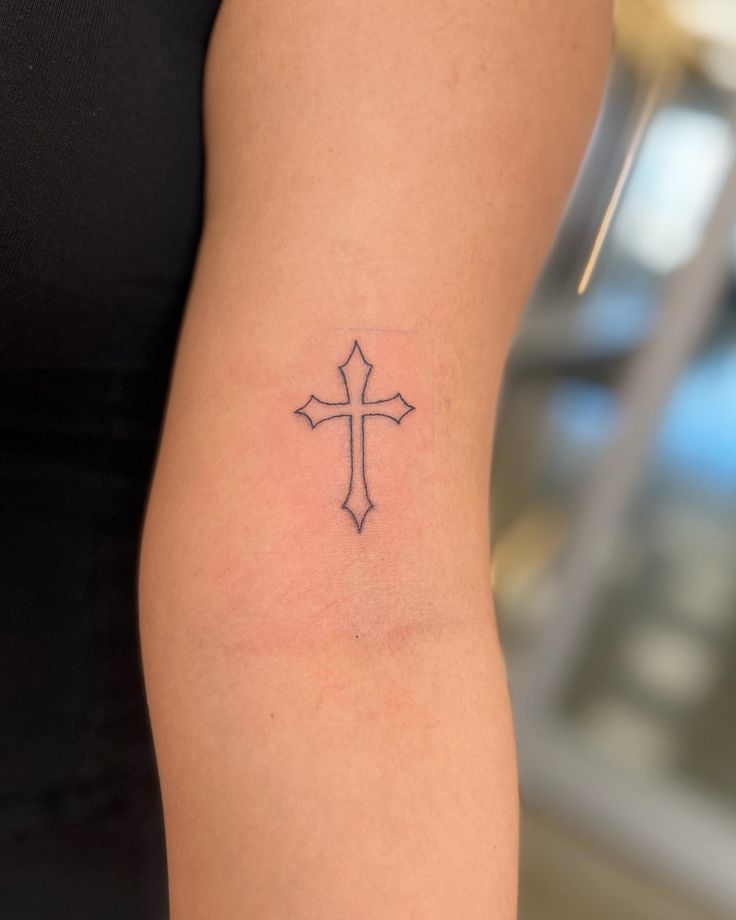 The Symbolic Power of the Tattoo Cross: Exploring the Meaning Behind this Timeless Design