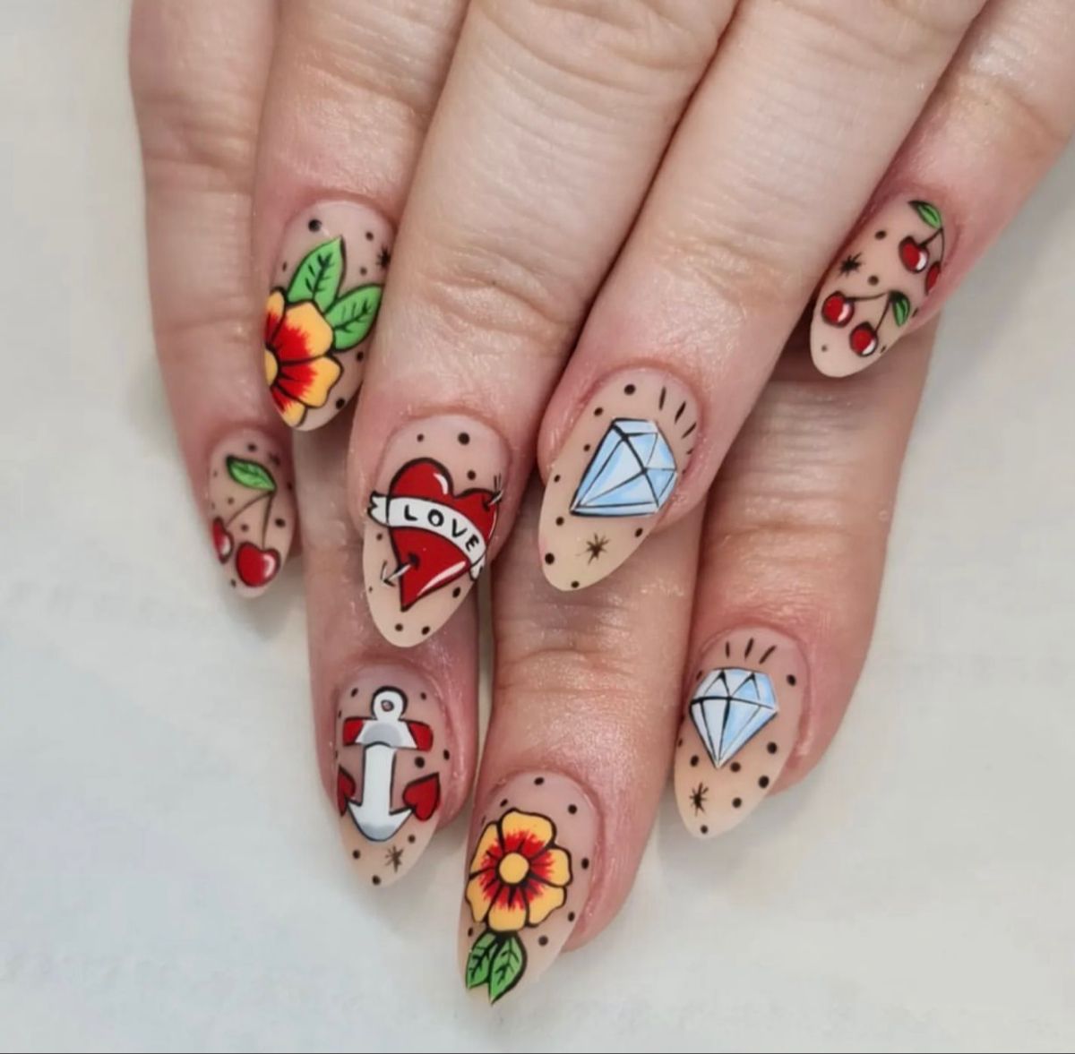 Trend Alert: The Rise of Tattoo Nails – The Edgy New Nail Art Trend Taking Over Instagram