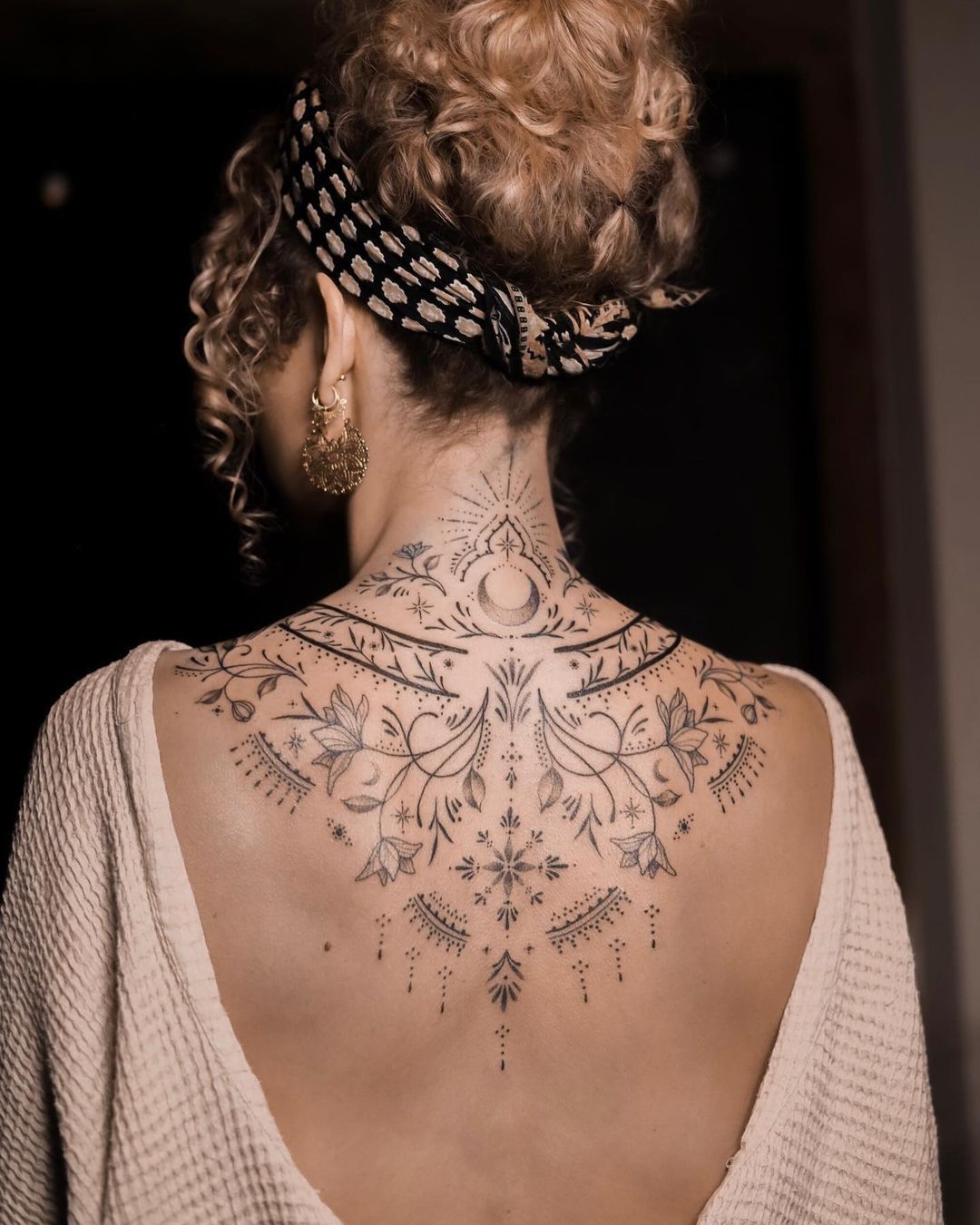 Exploring the Beauty and Symbolism of Back Tattoos on Women