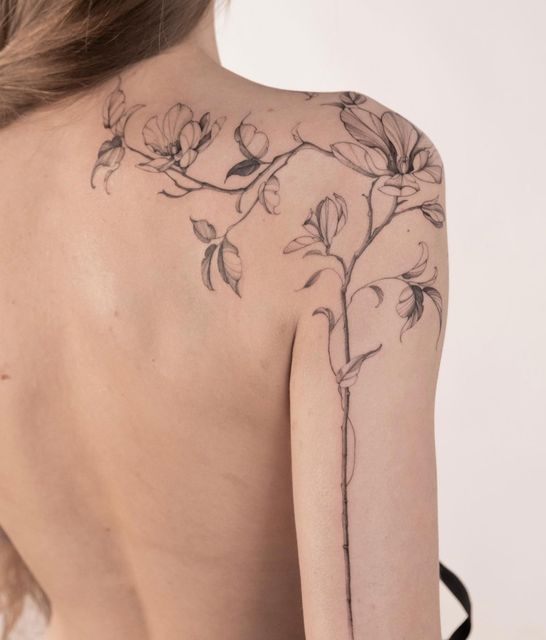 The Allure of Back Tattoos: A Look at the Artistry and Symbolism Behind Stunning Spine Ink