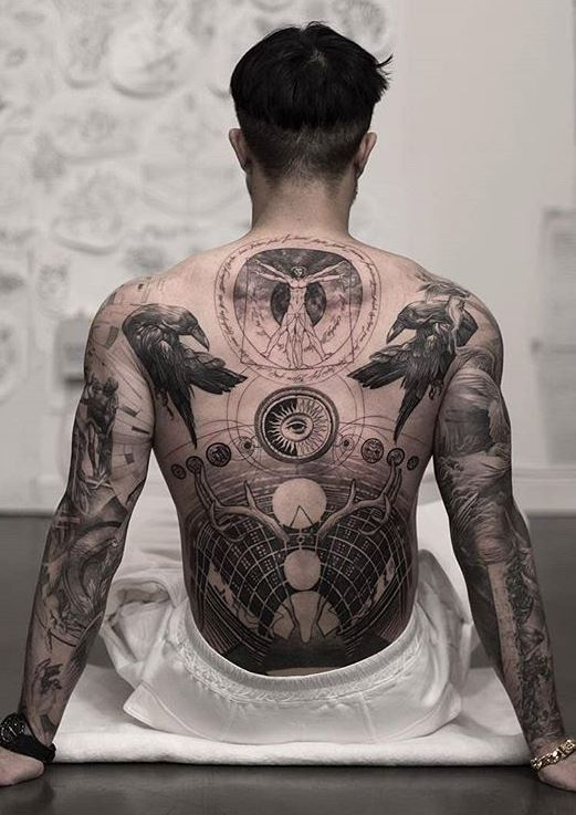 The Art of Tattooing: Exploring the Intricate Designs and Meaningful Symbolism of Back Tattoos