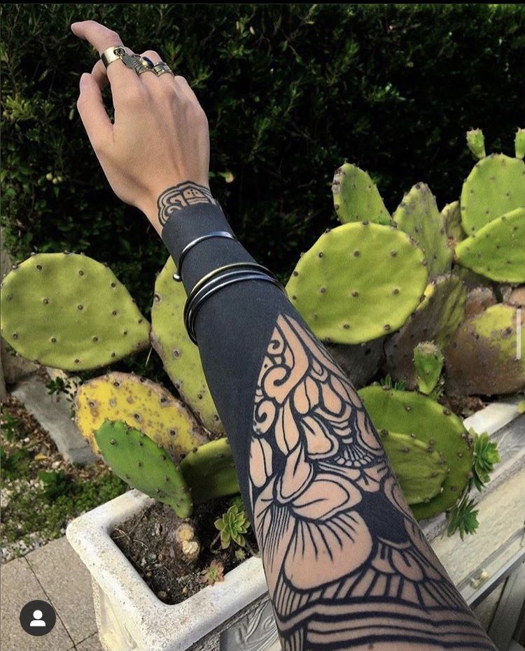 The Rise of Blackout Tattoos: Embracing the Bold and Beautiful