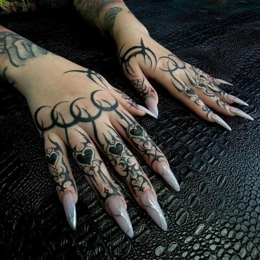 The Rise of Hand Tattoos: From Trendy Finger Ink to Statement Palm Designs