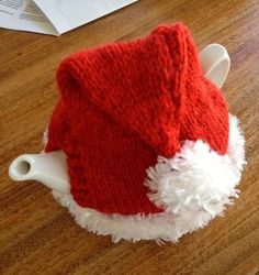 Santa Hat - Knitted Tea Cosy from the Marianne Collection.