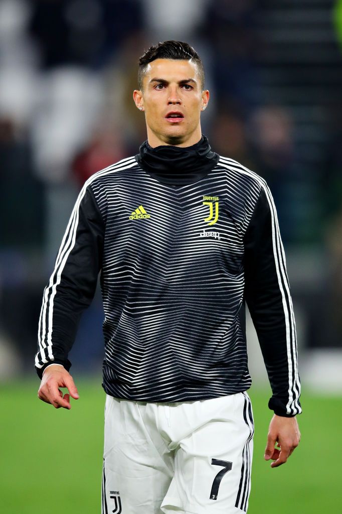 TURIN, ITALY – MARCH 12: Cristiano Ronaldo of Juventus warms up before the UEFA …