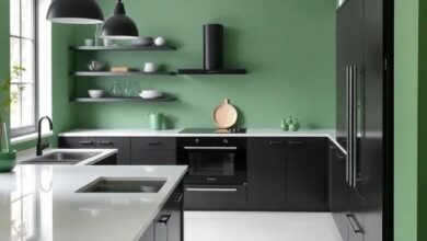 Elegant Harmony: Transforming Spaces with Black Kitchen Cabinets and Green Walls